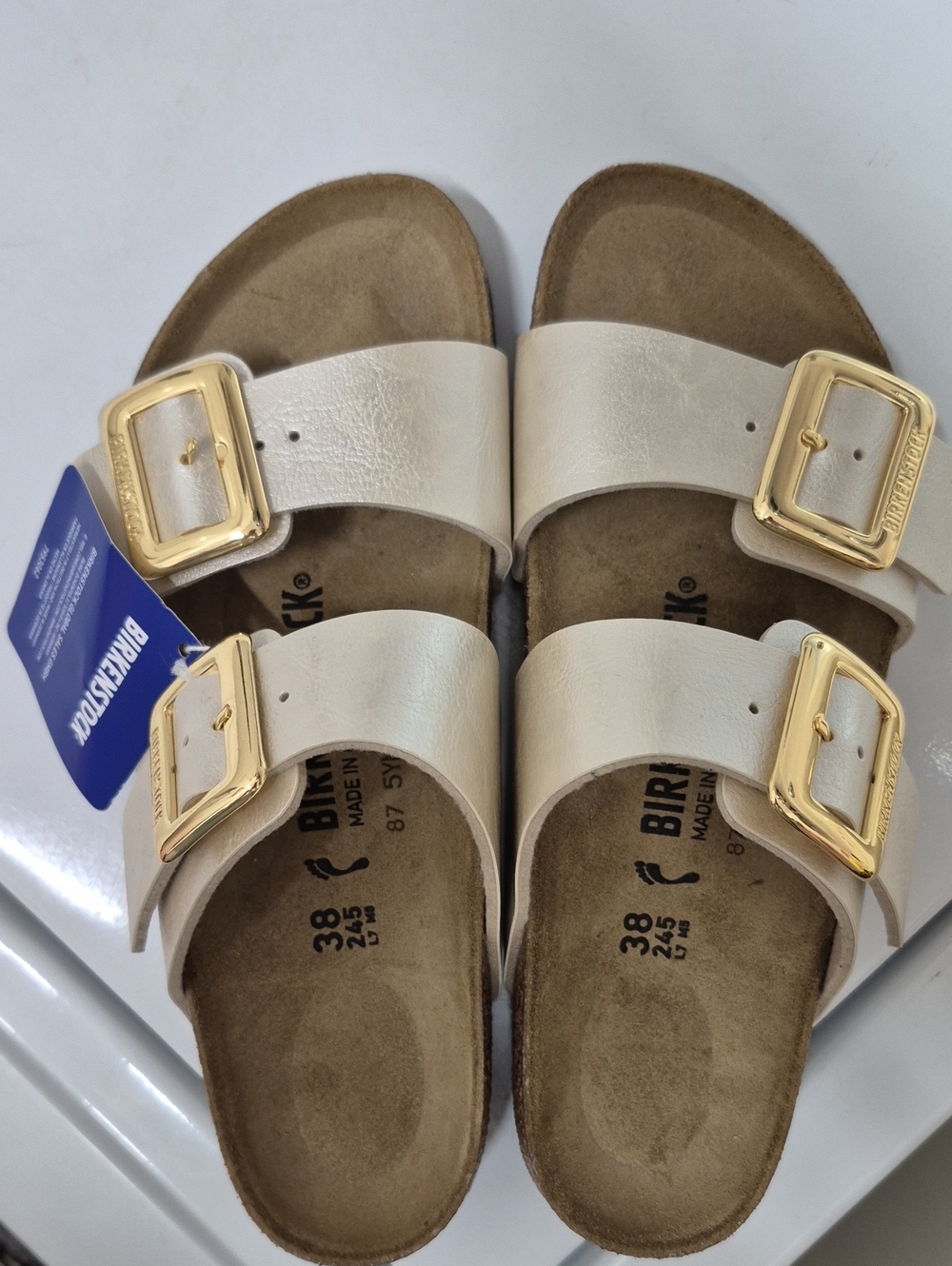Birkenstock Arizona Sandals in Light Metallic Pearl with Gold Buckles
